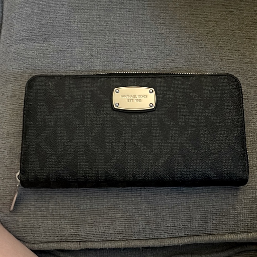 Michael Kors black wallet.